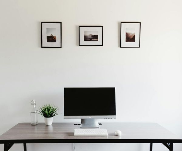 Minimalist workspace showing balance between technology and rest